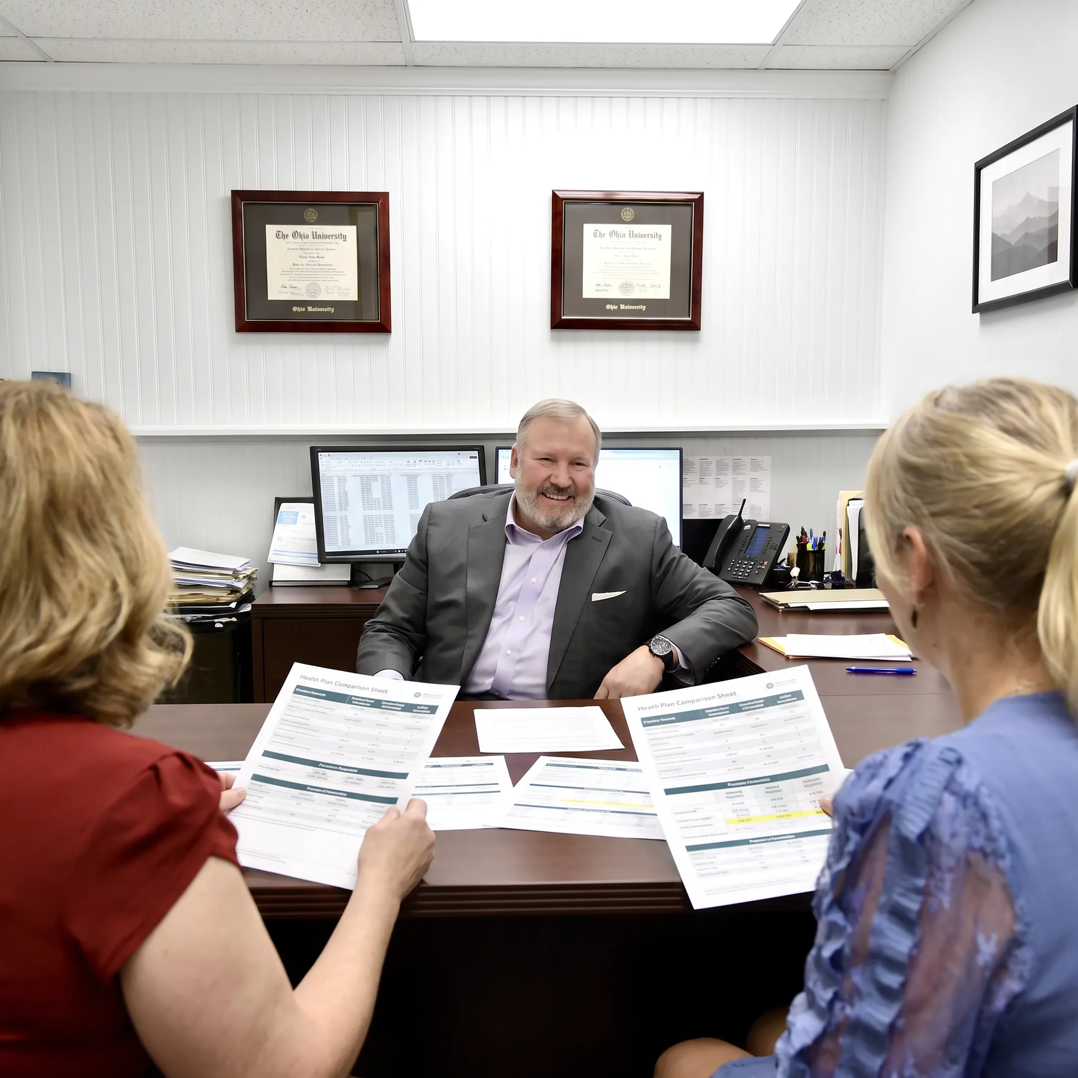 Agent explaining family health plan details