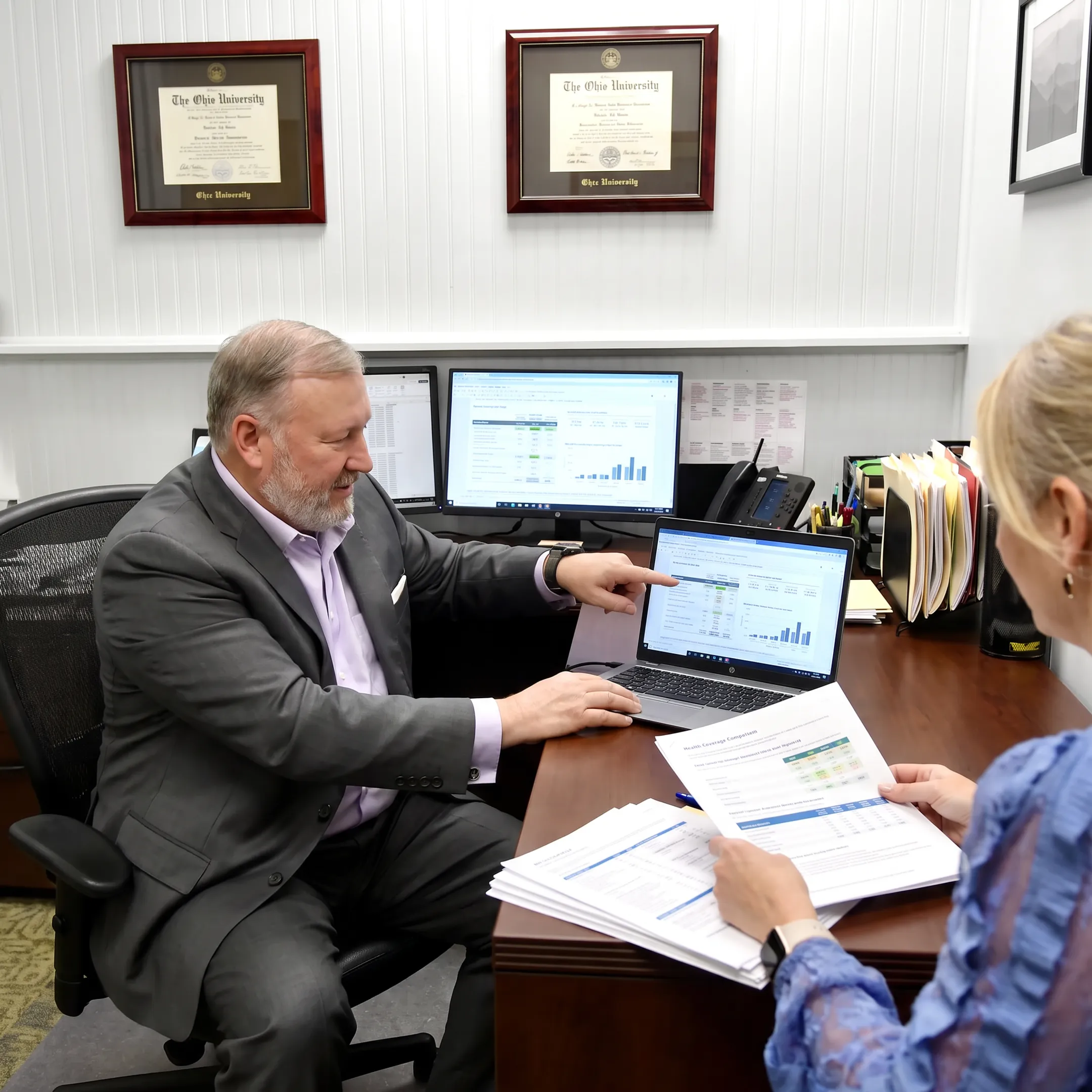Advisor explaining health insurance coverage details