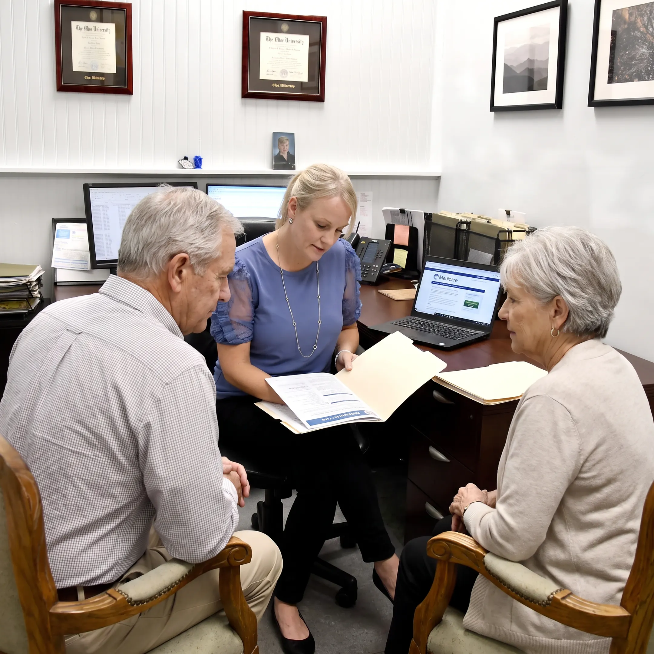 Medicare advisor discussing plan options with a couple