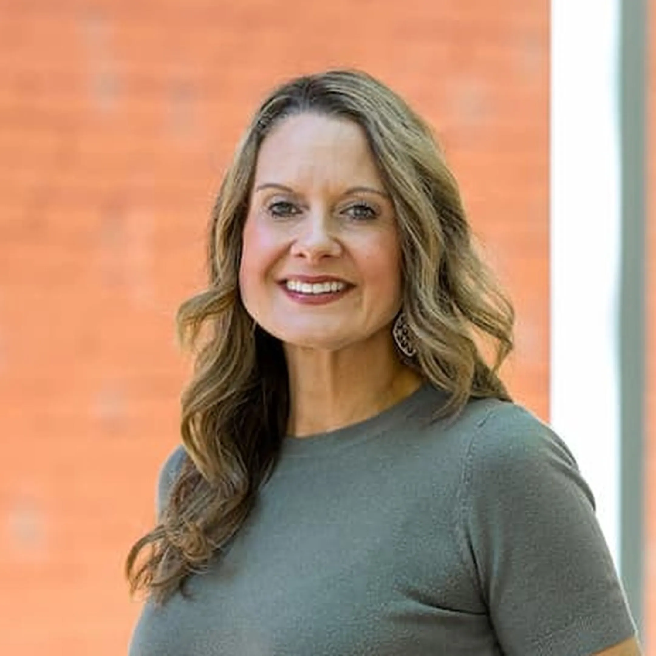 Portrait of Kelly Pruett, Employee Benefits Account Manager at Muneris Benefits
