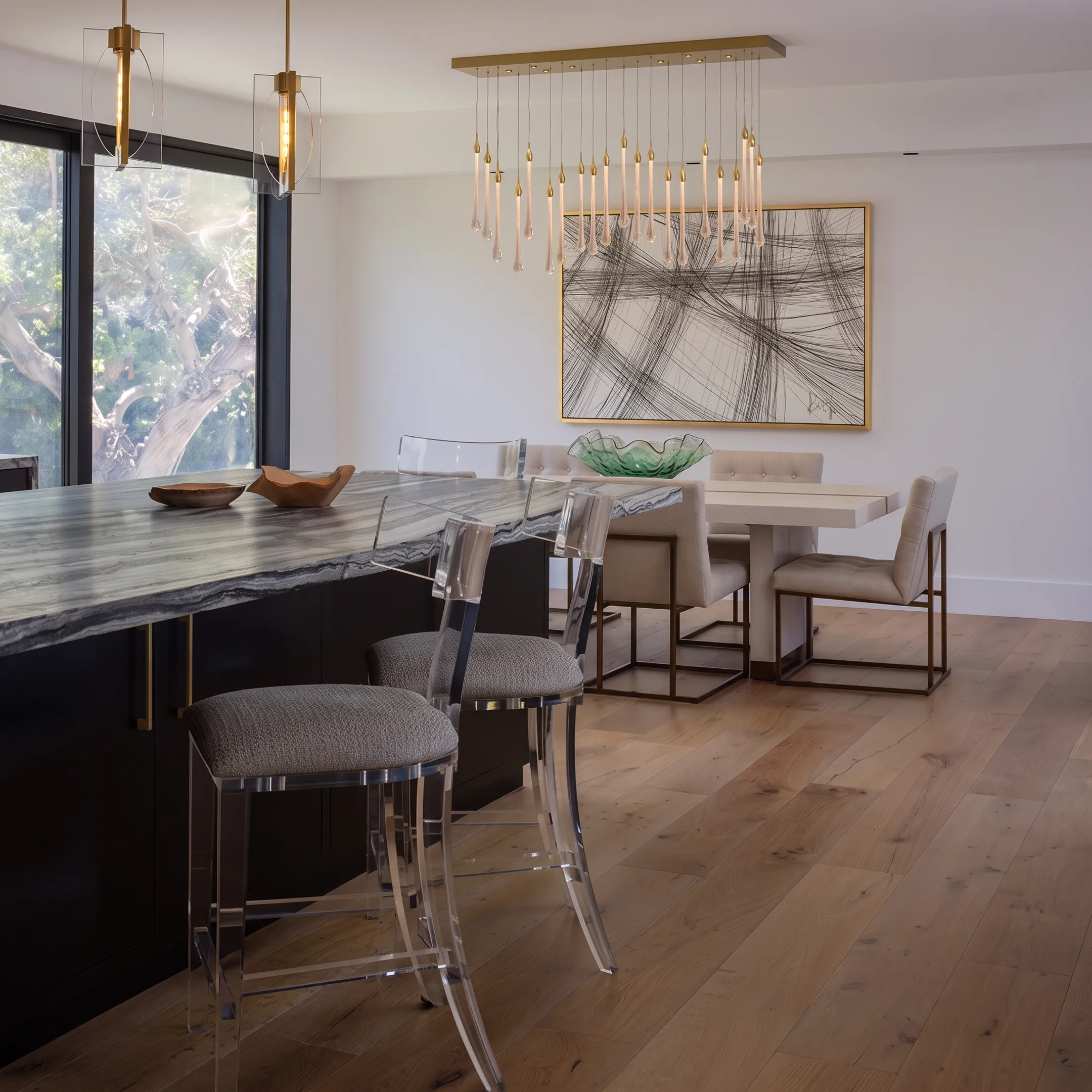 Elegantly staged dining and living area showcasing custom modern furniture in an upscale San Diego home.