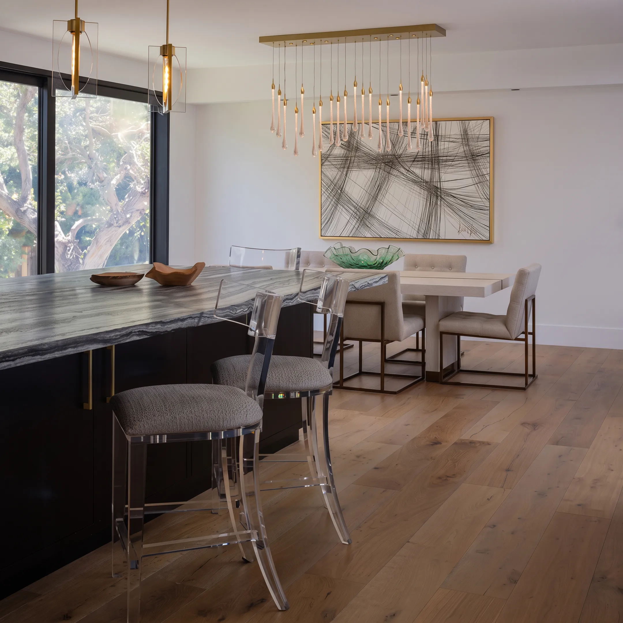 Professional interior designers placing decor accents in a staged Orange County luxury home