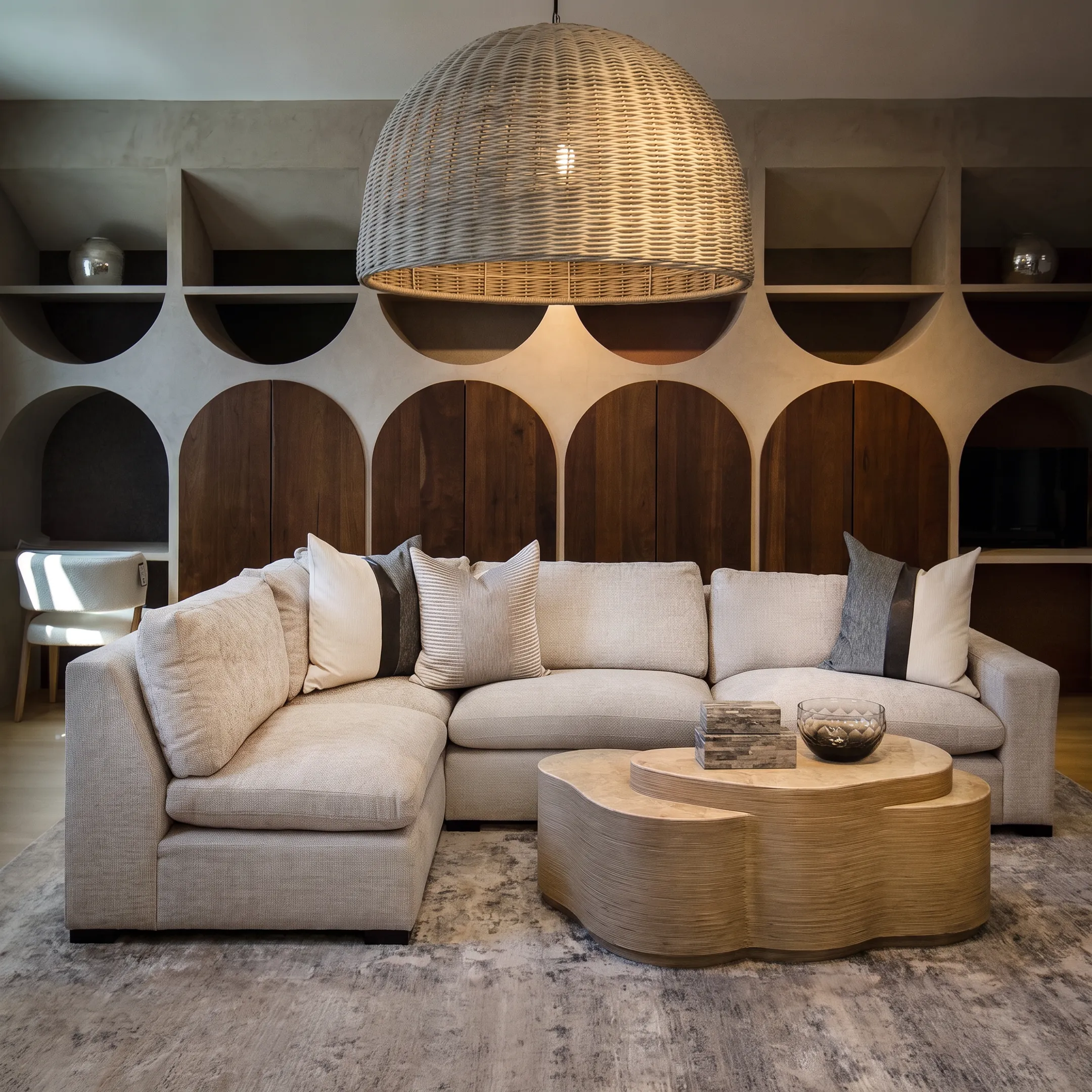 Beautifully furnished luxury living room illustrating balanced interior design and staging concepts