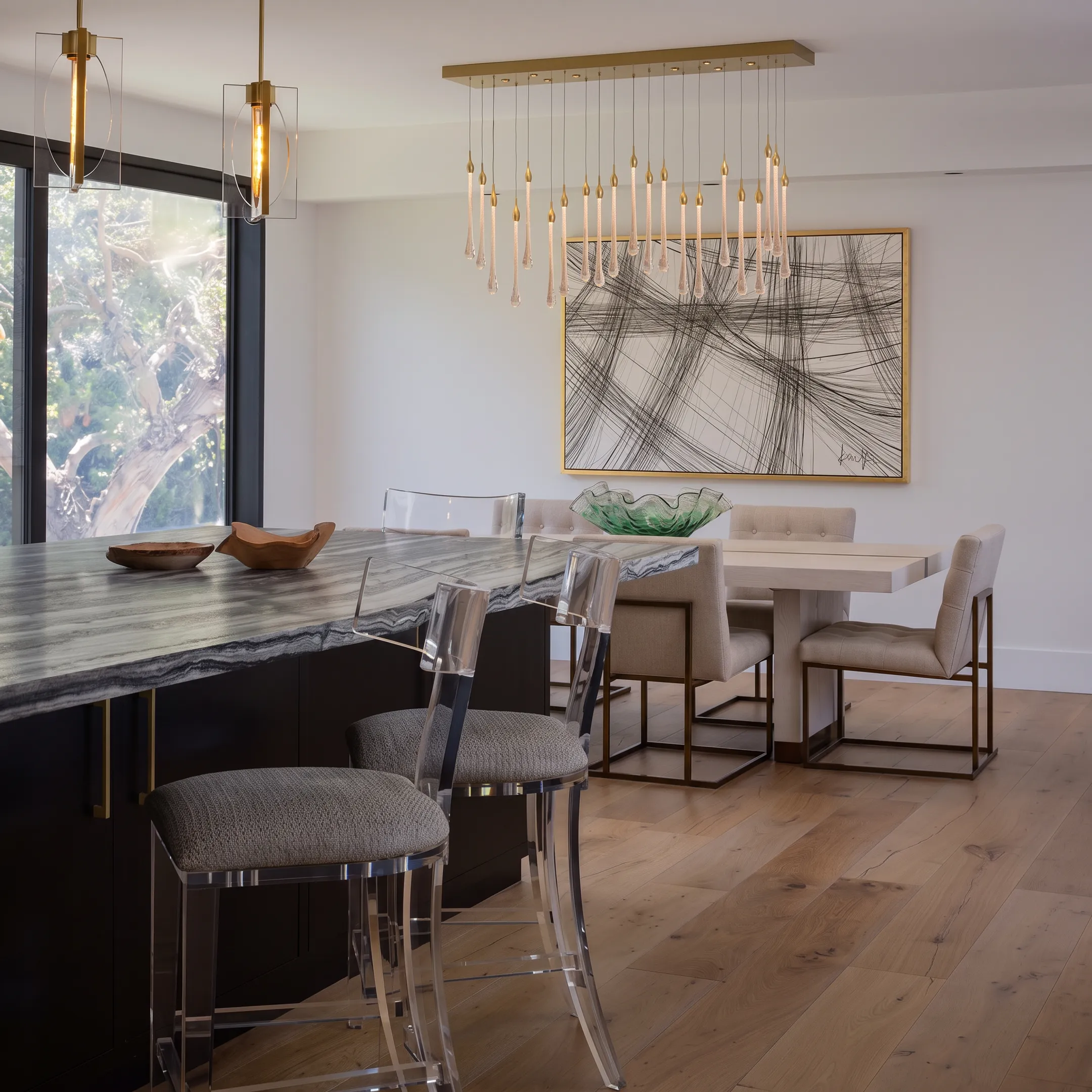 Modern luxury dining room featuring handcrafted solid walnut table and upholstered designer chairs