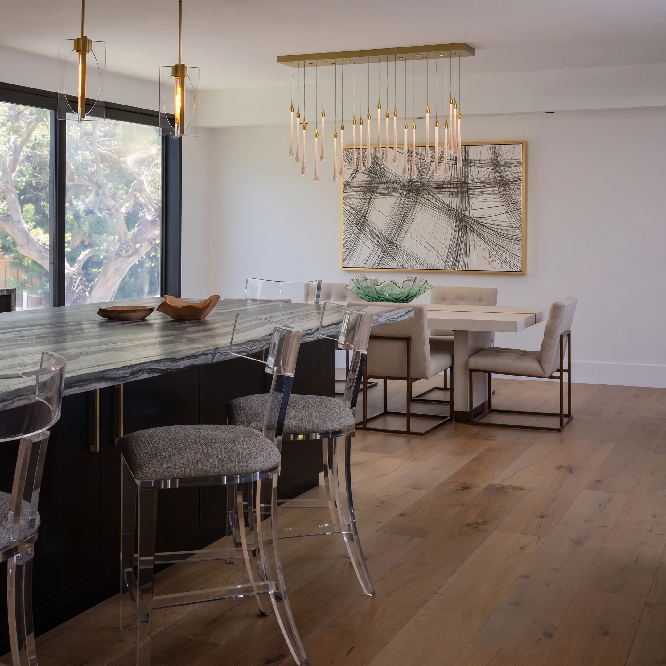 High-end staging furniture arrangement in open concept living room