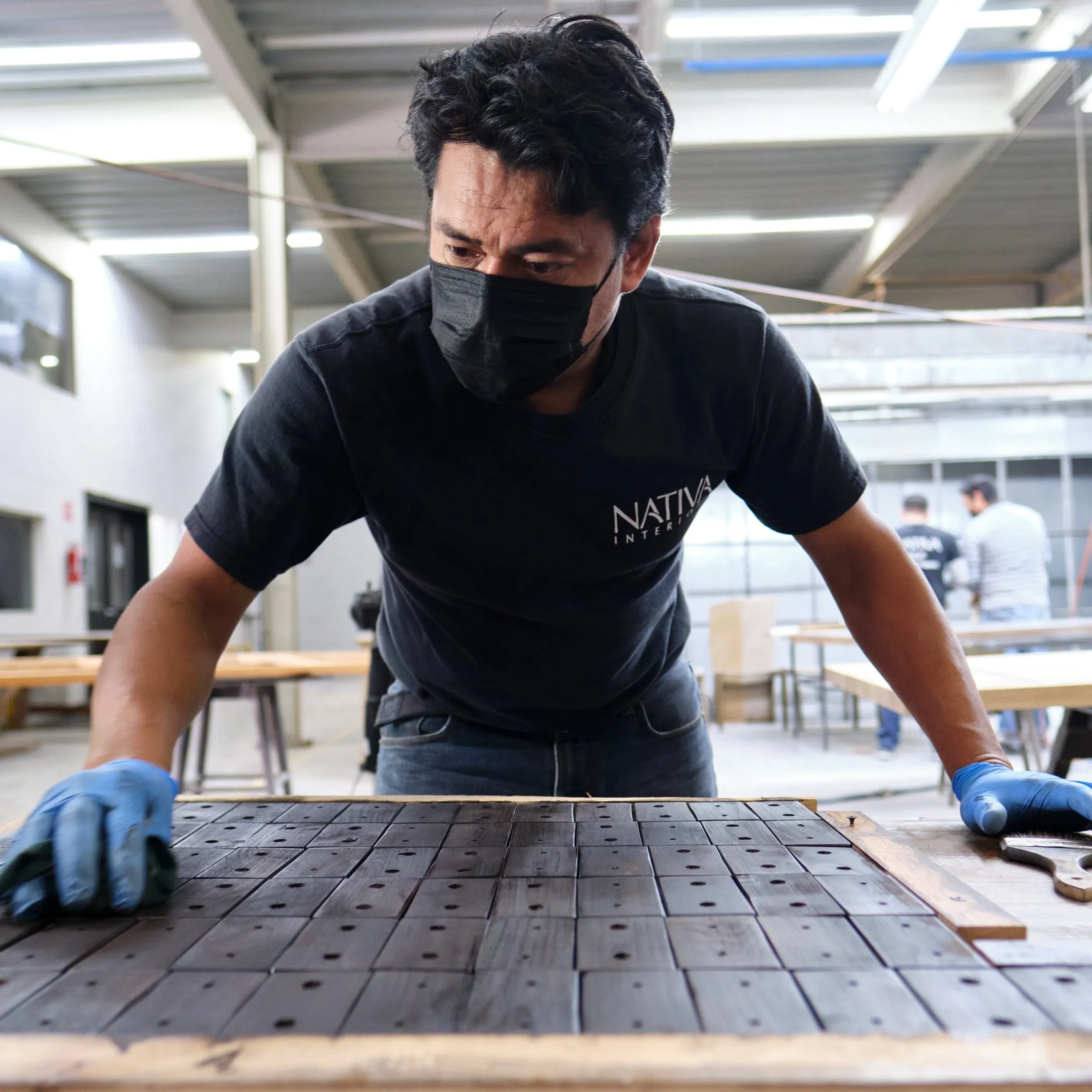 Handcrafted custom walnut furniture production in a workshop