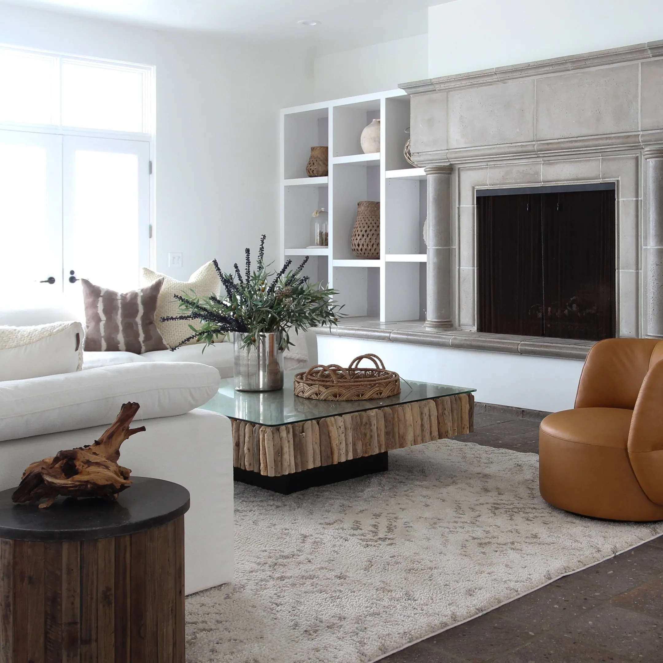 Luxury residential living room featuring custom handcrafted furniture and lighting
