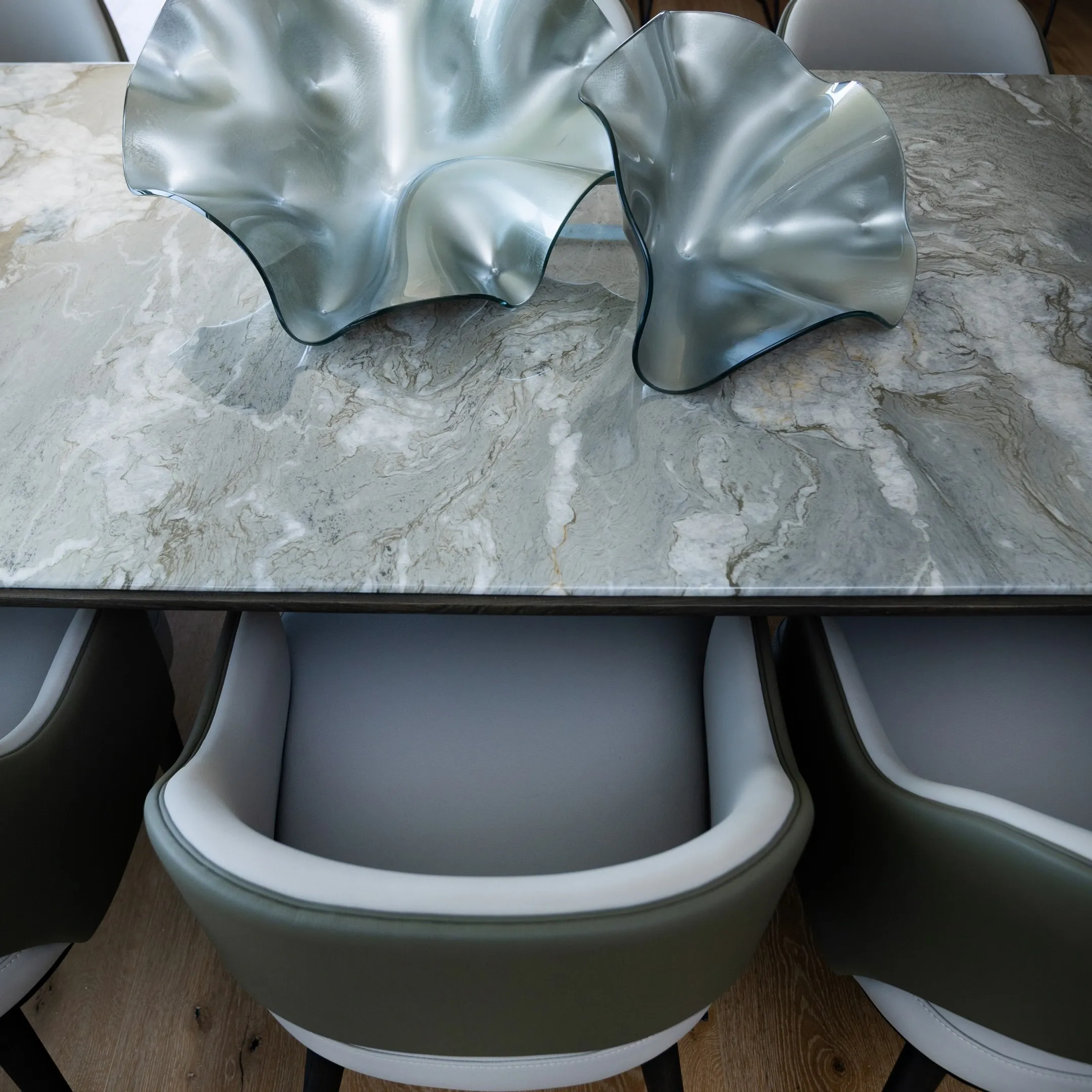 Custom residential interior design showcase with bespoke dining table and chairs