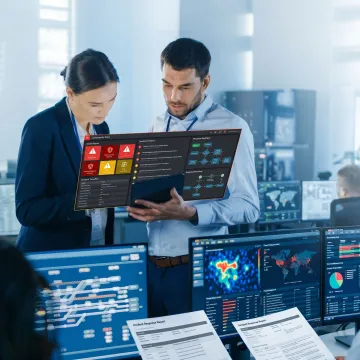 IT team reviewing security alerts and response plans