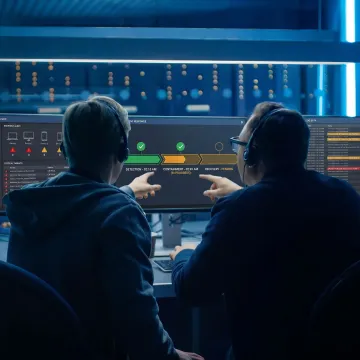 Analyst reviewing cyber incident data
