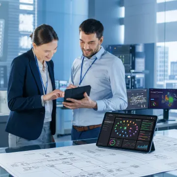 IT consultants reviewing managed technology solutions