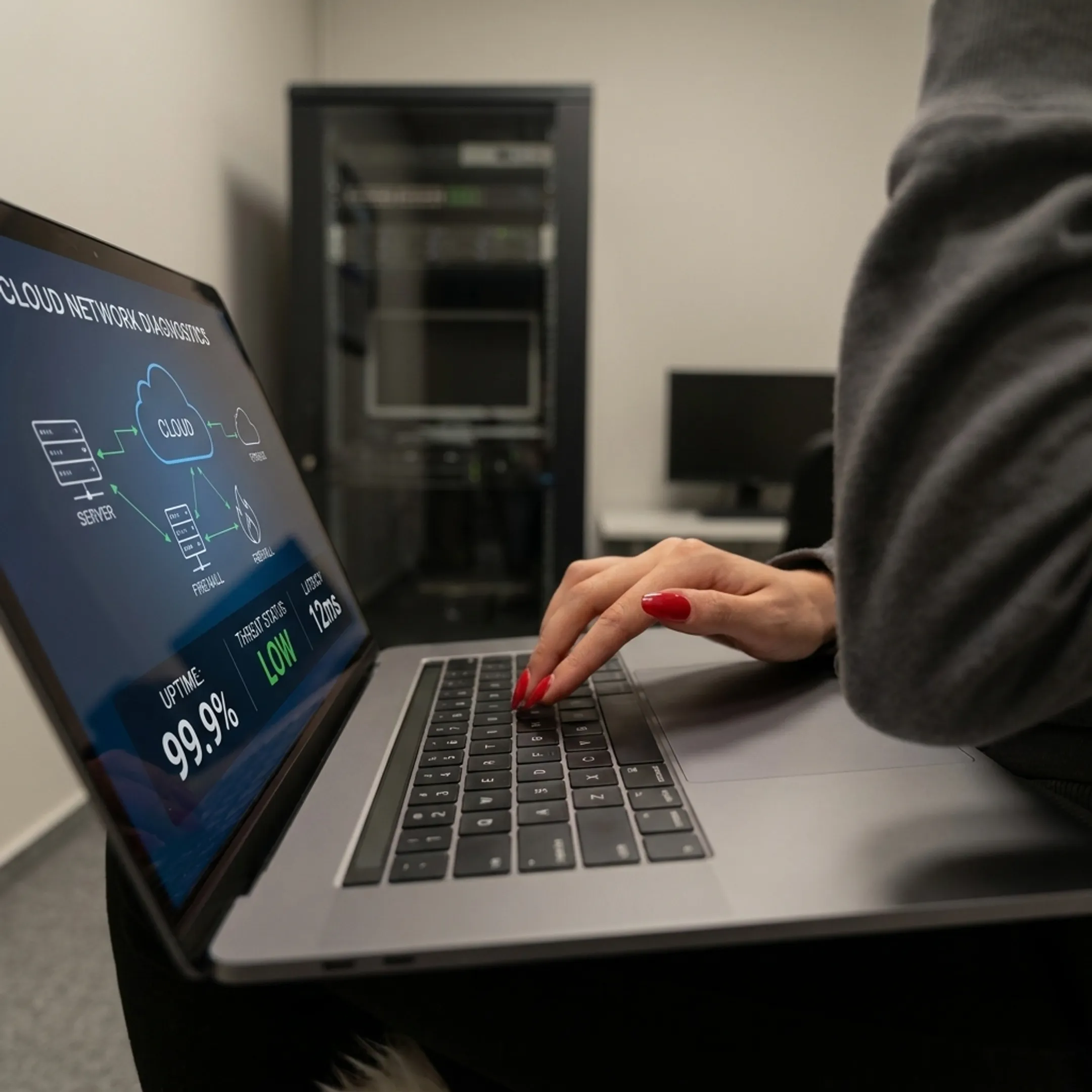 IT specialist reviewing network security diagnostics on laptop