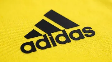 Heat-transfer vinyl film applied to athletic performance fabric label close-up