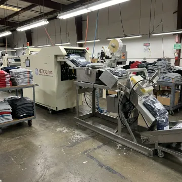 Industrial apparel labeling equipment in production