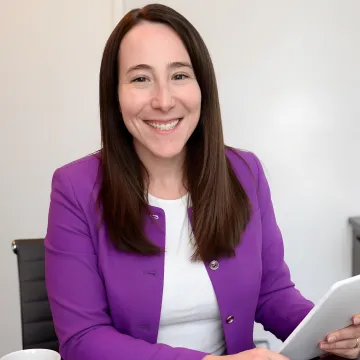Portrait of Dr. Eliza Barach, PhD, BCC, Owner and Founder of Neural Revolution
