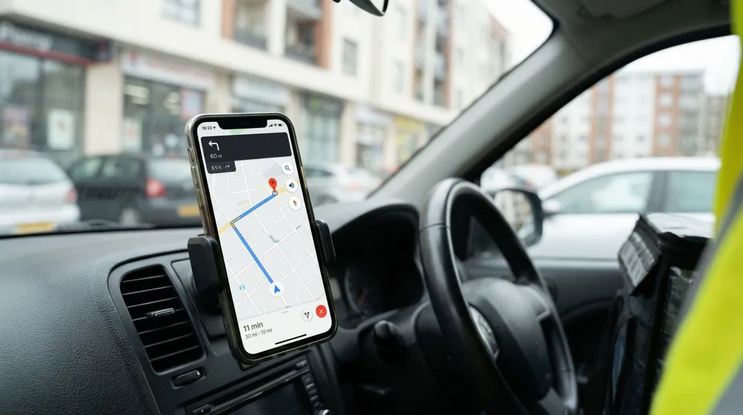 Fleet delivery driver arriving at customer location with GPS tracking active