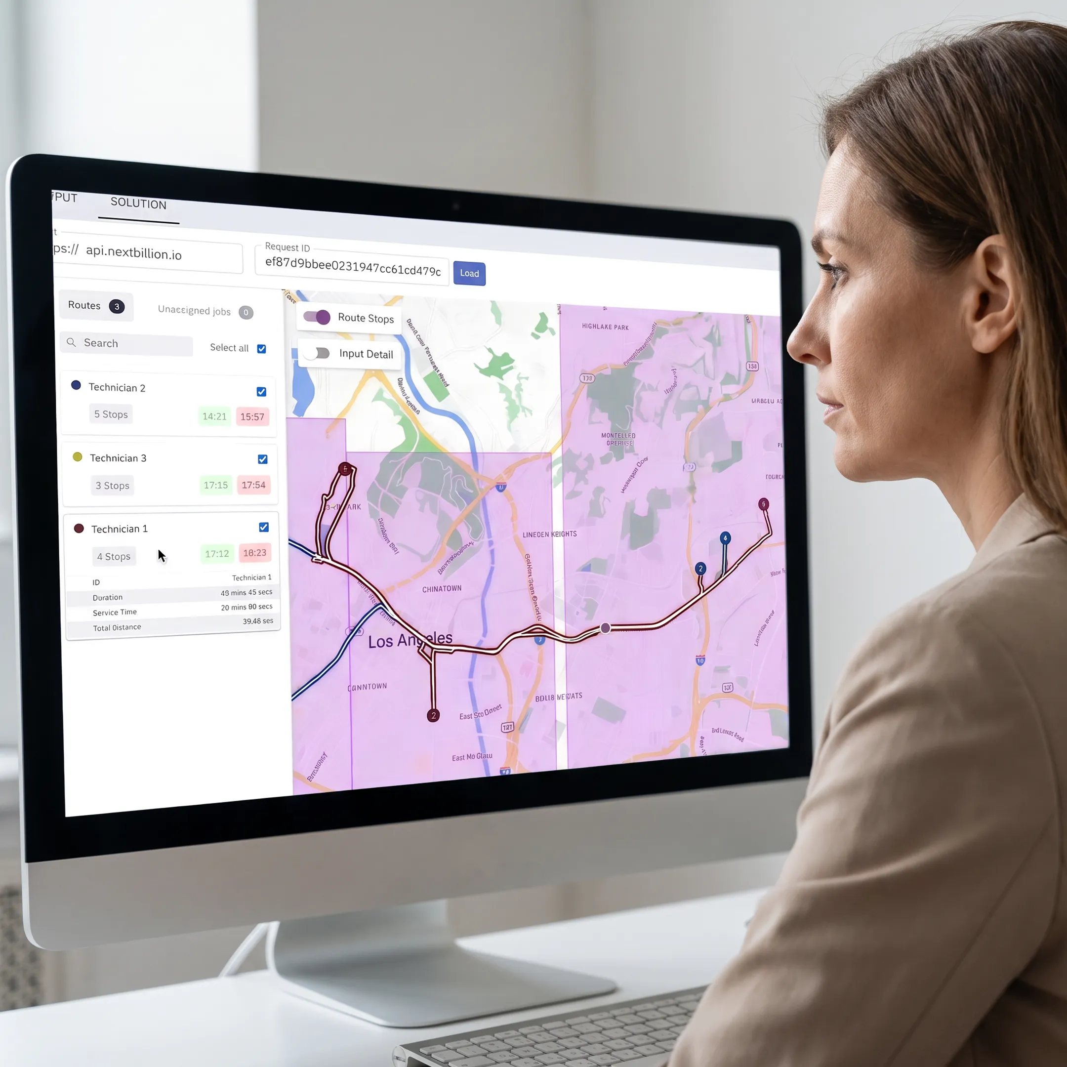 Window cleaning dispatcher reviewing optimized crew routes and scheduled appointments