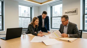 Commercial landlord and tenant negotiating office lease terms across conference table