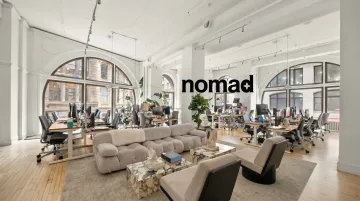 Completed NYC commercial office buildout interior with modern design and open workspace