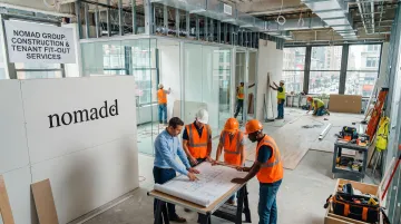 Nomad Group team managing commercial tenant fit-out construction project in Manhattan office