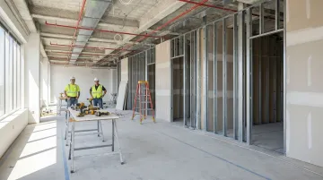 Modern commercial office buildout construction in progress with open floor plan