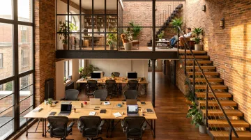 Modern coworking space interior with open desks private offices and amenities