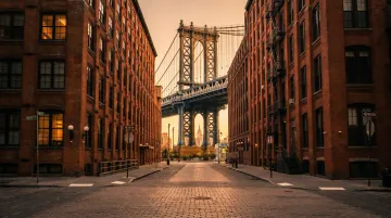 DUMBO Brooklyn neighborhood aerial view showing Manhattan Bridge and waterfront offices