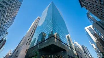 NYC commercial office building exterior highlighting Local Law 97 carbon compliance requirements