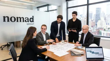 Nomad Group tenant rep team reviewing NYC office lease options with client