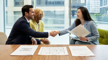 Manhattan commercial office lease negotiation tenant improvement allowance documents and handshake