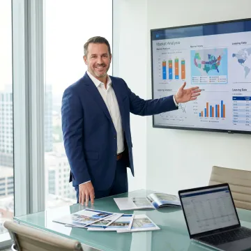 Commercial real estate advisor presenting office market insights