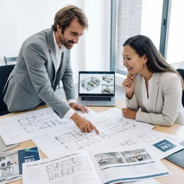 Team reviewing flexible office space options