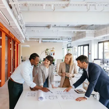 Facilities planning meeting for a growing office