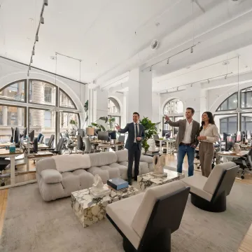 Startup team touring modern office space in NYC