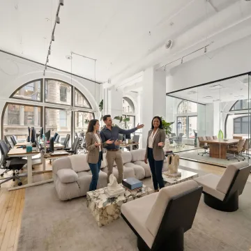 Startup team touring modern office space in NYC
