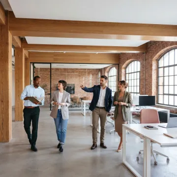 Team touring flexible office space in SoHo