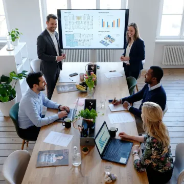 Brokerage team presenting office leasing strategy
