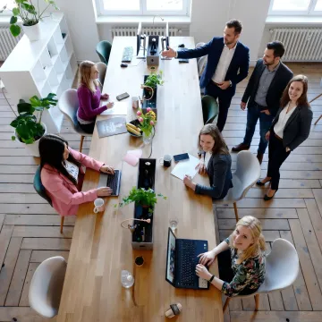 Startup team touring a private office suite