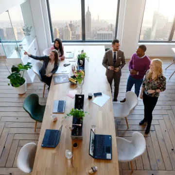 Startup team touring a modern office space