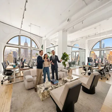 Startup team touring a flexible office space