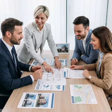 Commercial real estate advisors meeting with startup founders