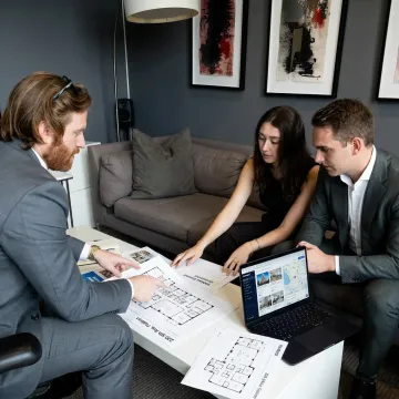 Team reviewing NYC office options