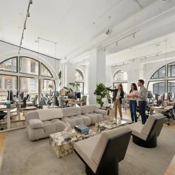 NYC startup team touring modern office space