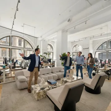 Startup team touring office space in NYC