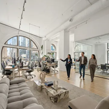 Startup team touring dedicated office space