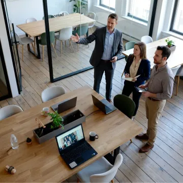 Startup team touring flexible office space