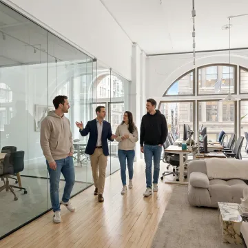 Startup team touring an NYC office space