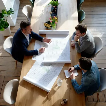 Advisor reviewing NYC office plans