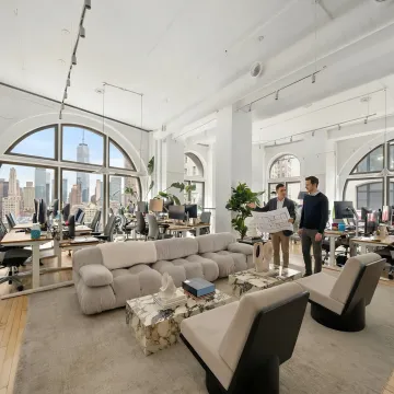 Commercial broker showing NYC office space to startup team