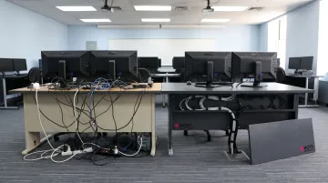 iMod wire management system installed in computer training desk with clean surface